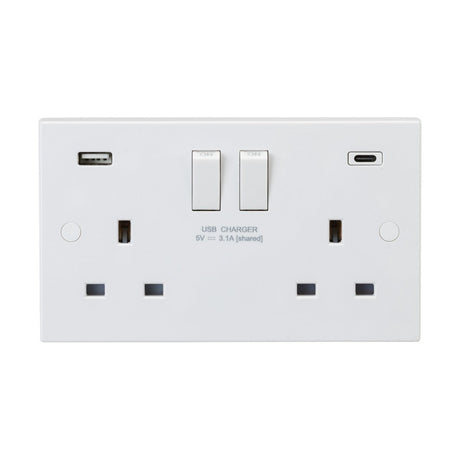 The 13A 2 Gang DP Switched Socket With Dual USB (Square Edge) in white offers a sophisticated Square Edge Plate design with two standard power sockets and dual USB ports, including both USB-A and USB-C options. It features two switches positioned above the outlets. This Double Pole USB Charger provides a shared output of 5V - 3.1A, as indicated beneath the switches.