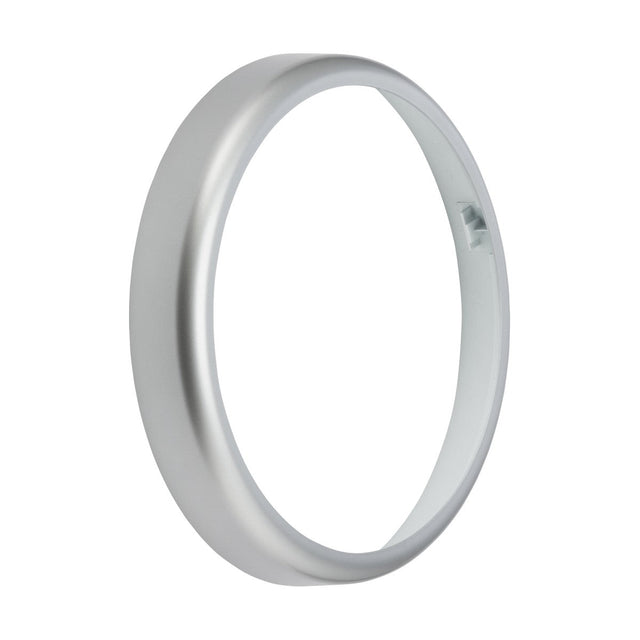 A sleek, silver metallic ring with a smooth polycarbonate finish and an open center is displayed against a plain white background, exuding a minimalist elegance reminiscent of the BT20 Bezel Accessory - Silver design.