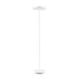The Nobe Floor Lamp - White showcases minimalist design through its slim silhouette, circular base, and round flat top. This piece embodies modern sophistication, effortlessly integrating into contemporary settings with its sleek and stylish profile.