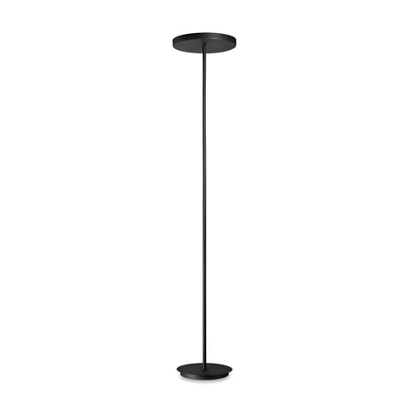 The Nobe Floor Lamp - Black is a sophisticated enhancement to modern interiors, showcasing a slender black pole and a round base. Its minimalist design with a flat circular shade adds an understated charm, bringing elegance and style to any space.