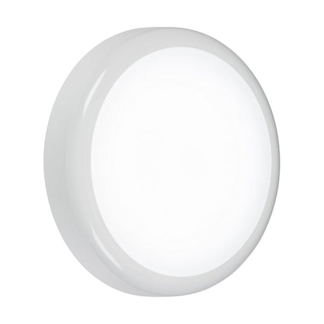 Introducing the 9W Outdoor IK08 CCT LED Bulkhead, an emergency and sensor-equipped circular ceiling light that boasts a sleek, minimalist design. It features a white frame and emits a bright, even glow, perfect for any setting.