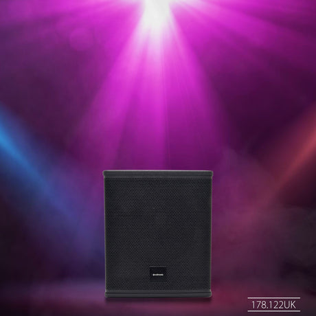 Citronic CASA-10BA active 300W subwoofer cabinet in matte black with steel grille, shown on a stage set with purple and blue lighting effects.