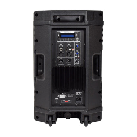 Rear view of the QTX QUEST-12A active PA speaker showing the media player panel, volume controls, XLR, jack and RCA inputs, heatsink and wheels.
