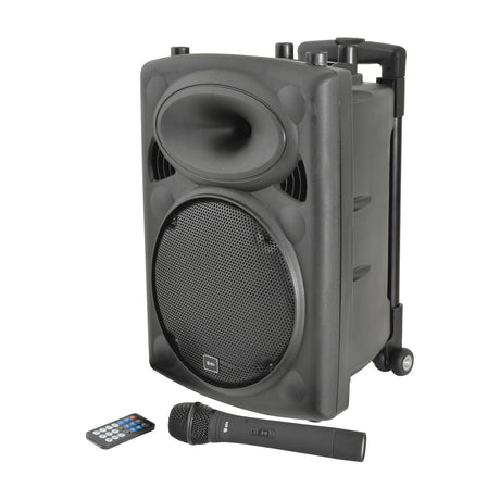 QTX QR10PA portable PA speaker in black with horn tweeter, woofer grille, trolley handle and wheels, shown with wireless UHF handheld microphone and remote.