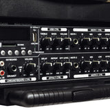 Close-up of the AVSL QTX DELTA-200 Portable PA System control panel showing USB port, SD slot, media buttons, and treble, bass, volume and effect knobs.