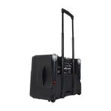 QTX DELTA-200 portable PA system by AVSL shown from the rear with extended trolley handle, two wireless microphones in holsters, and control panel.