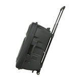 QTX QR15PA portable PA speaker by AVSL shown side-on with extended trolley handle, rear wheels, moulded grip and black casing on a white background.
