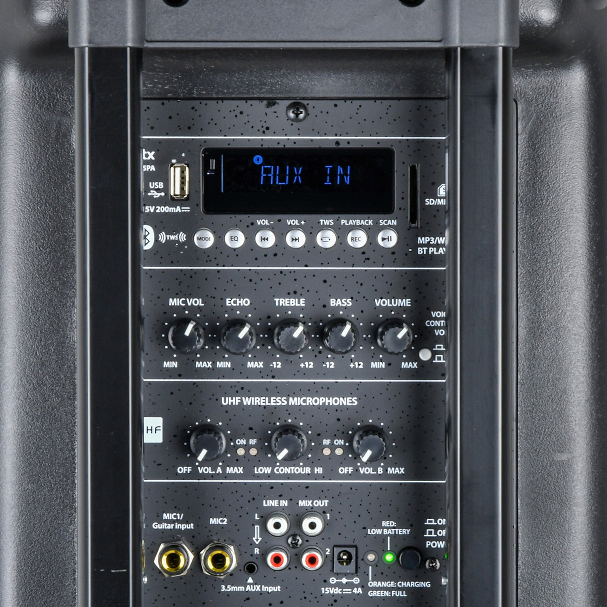 Rear control panel of the QTX QR15PA portable PA speaker showing AUX IN display, USB, SD slot, EQ knobs, UHF mic controls, and input jacks.