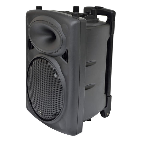 The QTX QR10PA Portable PA 10" is a versatile portable speaker system complete with a handle and wheels for easy transport. It features a large circular speaker grill on the front and a smaller oval opening above it. The built-in VHF wireless microphone makes it perfect for any event.