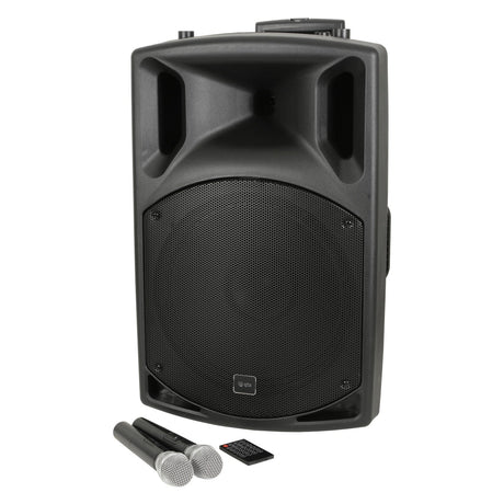 The QTX QX15PA-PLUS Portable PA UHF USB/SD/FM/BT is a sleek black unit featuring Bluetooth connectivity, a large front grille, and two UHF wireless microphones. It comes with a small remote control and built-in handles for effortless carrying.