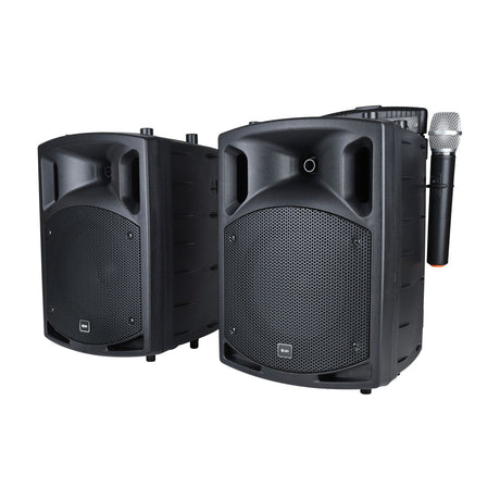 QTX PAV8 portable PA set with two black speaker cabinets and handheld UHF wireless microphone, shown on a plain white background.