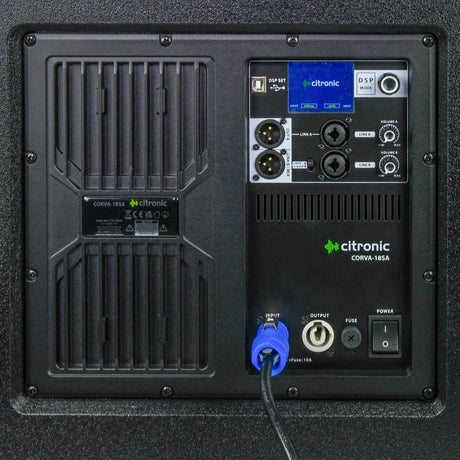 Rear panel of the Citronic CORVA-18SA active subwoofer showing DSP display, XLR link inputs, volume knobs, Powercon input and power switch.