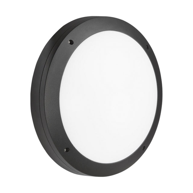 This 18W Outdoor CCT LED Bulkhead features a sleek black frame with a white diffuser, making it ideal for modern interiors. Its die-cast aluminum body presents a smooth, minimalistic look, complemented by four evenly spaced screws securing the frame. This fixture also includes emergency lighting capabilities and an integrated microwave sensor.