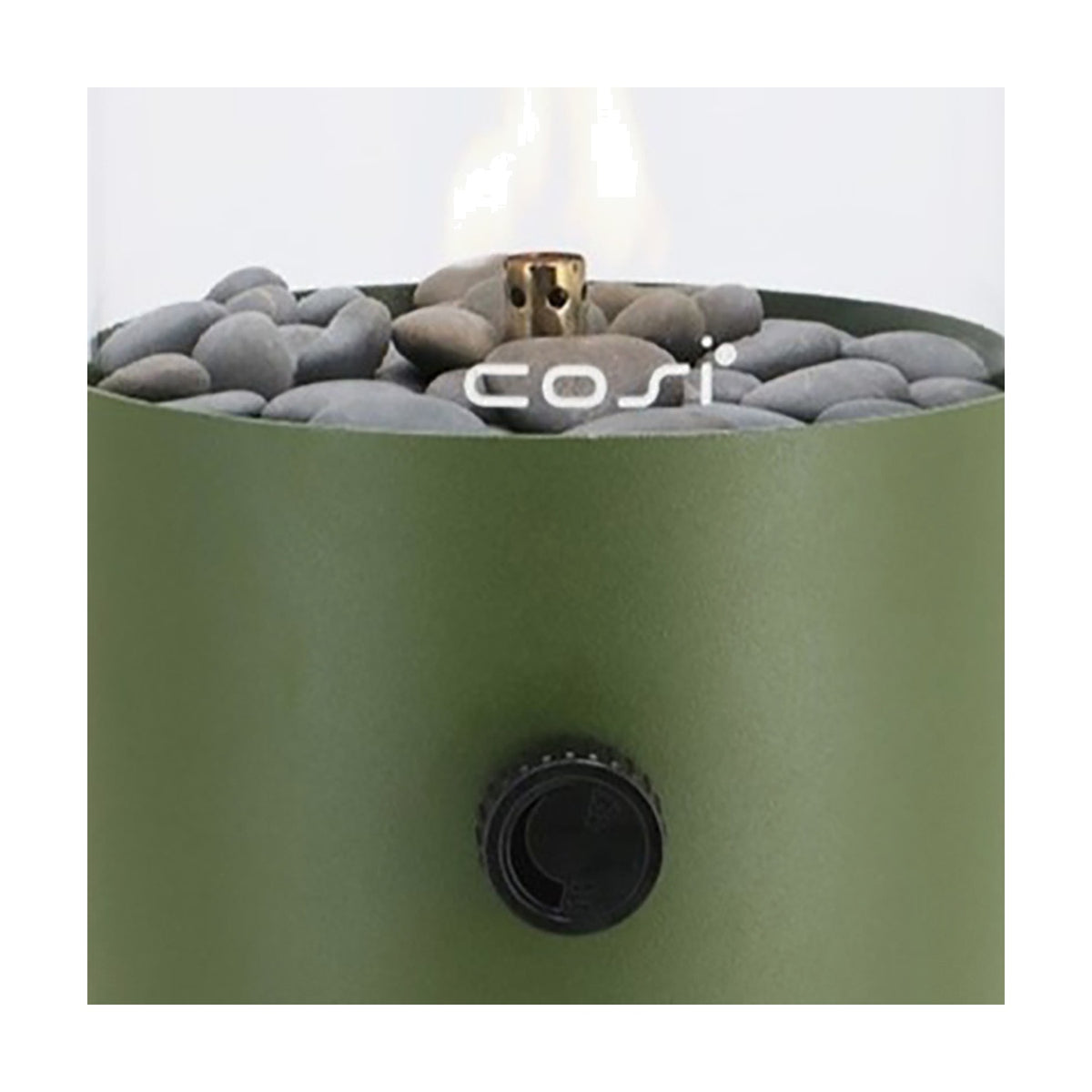 Close-up of the Cosi Moss Green Gas Flame Lantern showing grey pebbles, a brass burner with flame, a green steel body, and a black control knob.