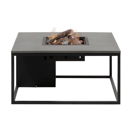 Cosi Black & Grey Gas Fire Pit Table, 100cm, with a grey stone-effect tabletop, black metal frame, and stainless steel burner with log set, shown alight on a plain white background.