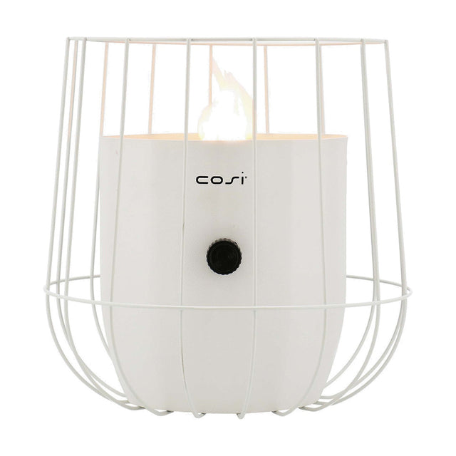 Cosi Basket White Gas Flame Lantern, 31cm, with a cylindrical white steel body inside an open wire cage frame, black control knob, and visible flame, shown on a plain white background.