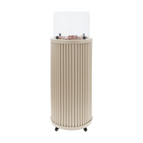 Cosi Tube Sandy Beige Gas Lantern, 106cm tall, with ribbed aluminium body, glass hood, decorative stones and castor wheels, on a plain white background.