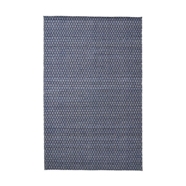 Rectangular indoor outdoor rug in denim blue and white with a small-scale diamond ikat pattern, shown flat against a plain white background.