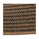 Close-up of the Indoor Outdoor Natural & Slate Grey Design Rug, showing a woven houndstooth-style pattern in tan and charcoal polypropylene with a stitched edge.