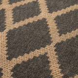 Close-up of the Indoor Outdoor Natural & Slate Grey Diamond Design Rug, showing woven polypropylene fibre in a tan and dark grey trellis pattern.