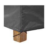 Close-up of the Firetable Aerocover, 84 x 64cm, in anthracite fabric fitted over a wooden furniture leg, showing corner seam and drawstring toggle detail.