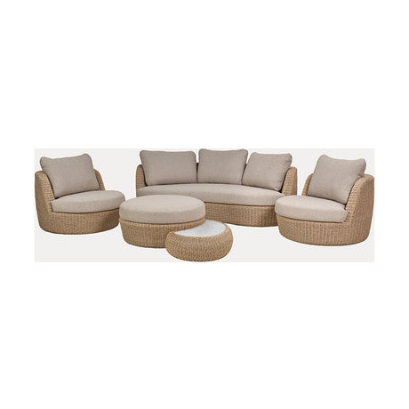 Kampala Outdoor Lounge Set in woven beige polypropylene, featuring a curved three-seat sofa, two round swivel chairs, an oval ottoman and a glass-top coffee table on a plain white background.