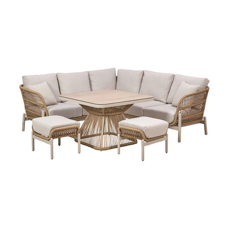 Martic outdoor corner seating set with woven latte rope frames, beige cushions, a glass-top table on a woven pedestal base, and two matching footstools on a white background.