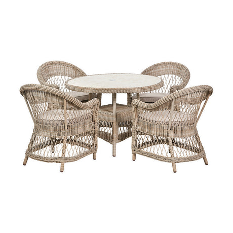 Pattaya Outdoor 4 Seater Dining Set with round glass-top table and four woven armchairs in sand-beige rattan, aluminium frame, on a plain white background.