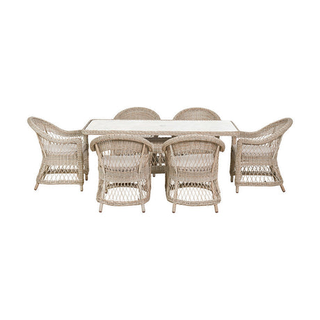 Pattaya Outdoor 6 Seater Dining Set with rectangular table and six woven armchairs, sand-beige synthetic rattan on aluminium frames, shown on a plain white background.