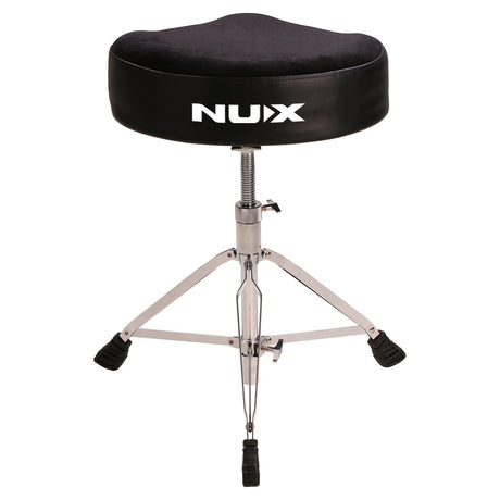 A saddle-style, cushioned NU-X Drum Throne in black, featuring a metallic, height-adjustable tripod base with rubber-tipped legs for enhanced stability.