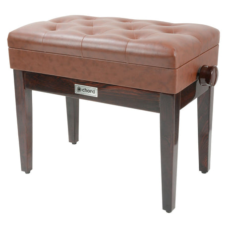 The Chord Piano Bench With Storage - Brown is a tufted piano bench featuring a wooden frame, dark wooden legs, and a branded label on the side. This adjustable bench includes an easy-to-use knob for height customization.