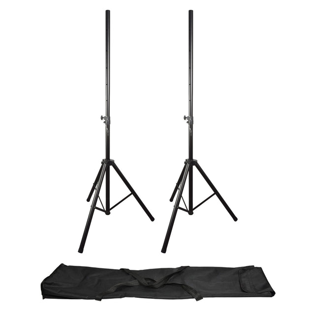 A pair of QTX Speaker Stand Kits, featuring two height-adjustable black stands capable of supporting up to 35kg each, are arranged side by side. Beneath them lies a black carrying bag designed for convenient transport. The steel stands and bag are displayed against a plain white background.