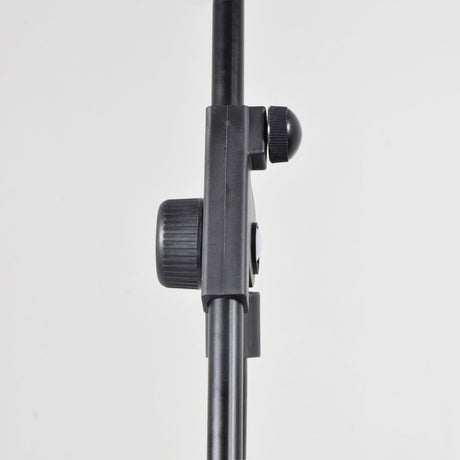 Close-up of the Chord boom microphone stand's black adjustment clutch and tightening knobs on the vertical stem, shown against a plain white background.