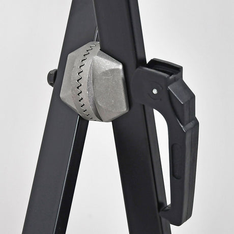 Close-up of the Chord double X-frame keyboard stand by AVSL, showing the toothed metal lock mechanism and black steel frame against a light background.
