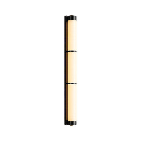 The Arelis LED Linear Alabaster Wall Light in Soft White & Black features a tall, narrow cylindrical shape with a warm beige diffuser and black metal bands, shown on a white background.