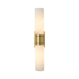 The Velaris 2 Light Double Alabaster Wall Light in soft white and brass offers a sleek, modern look with its dual white cylinders—perfect for contemporary interiors.