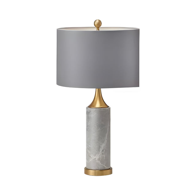 The Valoma 1 Light Sculpted Marble Table Lamp in brass and grey features gold accents and a round gray lampshade, displayed against a white background.