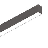 The Sparx Linear LED Suspension Light 27W 3000K - Black, measuring 1205mm, is showcased against a white backdrop. Featuring a minimalist elongated rectangular design and a sleek dark frame, it perfectly captures the essence of modern linear lighting while providing an energy-efficient solution for contemporary spaces.