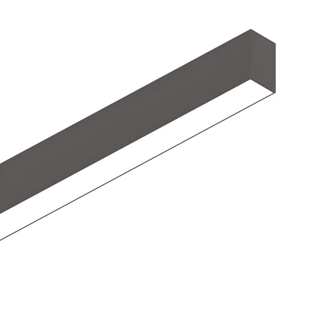 A Sparx Linear LED Suspension Light 27W 4000K in black, measuring 1205mm, is shown suspended against a white background from an angle, highlighting its minimalist and sleek design.