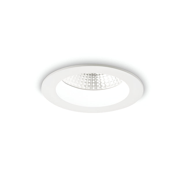 The Radiara-1 Round LED Recessed Downlight features a minimalist circular design with a die-cast aluminium construction, a white rim, and a textured reflective interior. Positioned against a plain white background while turned off, this 10W light at 3000K offers an elegant and modern aesthetic ideal for contemporary spaces.