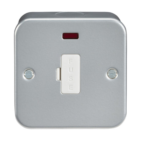 The Metal Clad 13A Fused Spur Unit Neon is a square electrical switch with "FUSE" labeled on the central white switch. It features a small red neon indicator light at the top and is rated for 13A. The unit is housed in a durable, heavy-duty metal clad box and is mounted with two visible screws on each side.