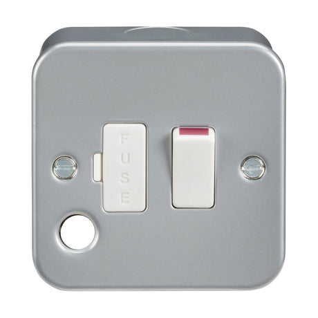 The Metal Clad 13A Switched Fused Spur Unit With Flex Outlet is a silver, wall-mounted electrical switch made from premium-grade steel. It features a fuse switch labeled "FUSE" and a standard switch with a red indicator dot. A heavy-duty metal clad box secures the unit, visible with mounting screws on either side.