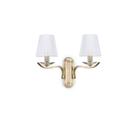 Introducing the Solum 2 Light Wall Light - Brass, featuring two elegant organza lampshades. This fixture boasts curved arms extending from a central base, delivering classic luxury lighting to any setting.