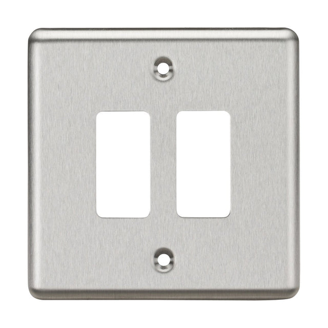 The 2 Gang Grid Faceplate - Rounded Edge Brushed Chrome is designed with a sleek appearance featuring two rectangular openings and three screw holes, making it ideal for seamless integration into the Knightsbridge Grid System.