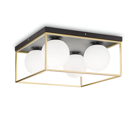 The Dawn 4 Light Flush - Brass features a modern design with white spherical bulbs encased in a sleek, square brass frame. This minimalist flush light is mounted on a black base for seamless ceiling integration, epitomizing contemporary elegance and style.