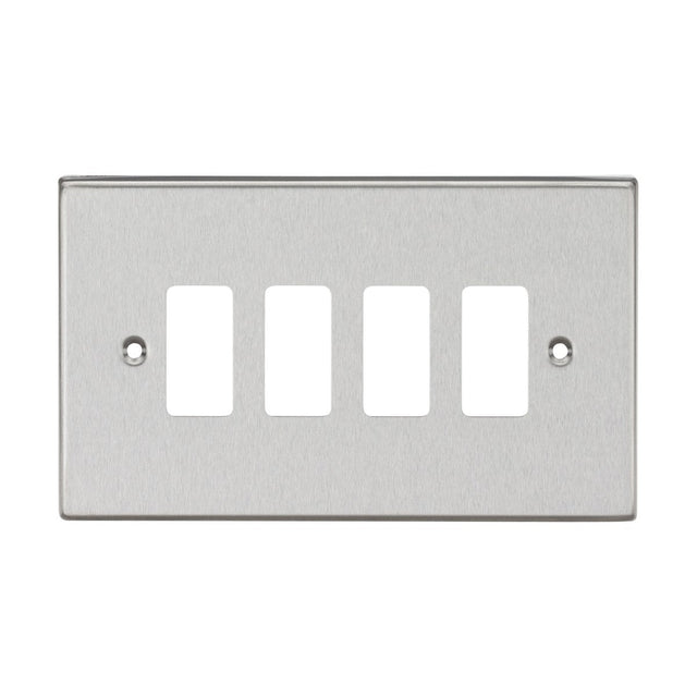 Introducing the 4 Gang Grid Faceplate - Brushed Chrome, a metallic wall plate with a sophisticated square edge. It features four rectangular openings arranged in a grid and includes two screw holes for straightforward installation.