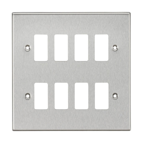 The 8 Gang Grid Faceplate in Brushed Chrome features the Knightsbridge Grid System and offers six rectangular openings for rocker switches, along with four screw holes for easy mounting, one in each corner.
