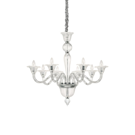The Starbeam Glass 8 Light Chandelier - Chrome showcases a contemporary aesthetic with its eight gracefully curved arms, each supporting a candle-shaped bulb. The chandelier's decorative central column is made from transparent blown glass, and the fixture hangs elegantly by a wrapped cord.