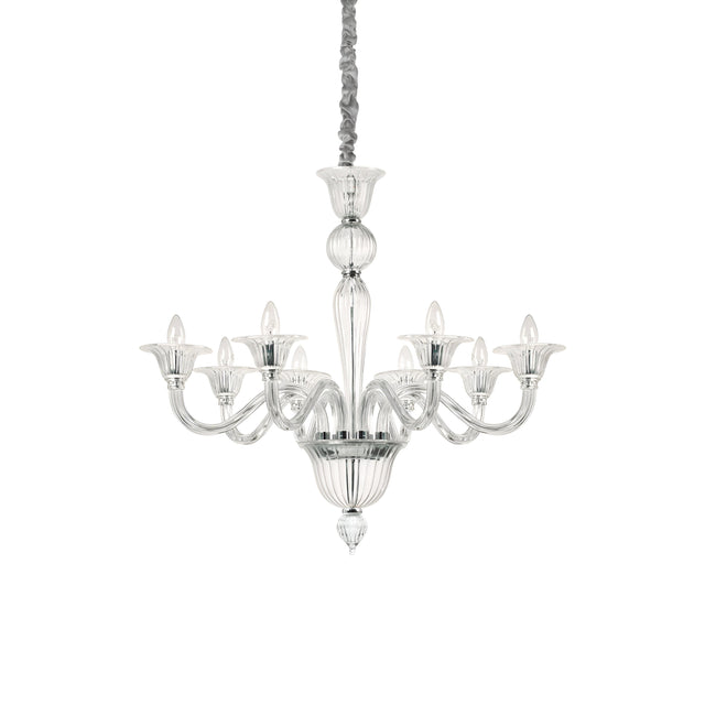 The Starbeam Glass 8 Light Chandelier - Chrome showcases a contemporary aesthetic with its eight gracefully curved arms, each supporting a candle-shaped bulb. The chandelier's decorative central column is made from transparent blown glass, and the fixture hangs elegantly by a wrapped cord.