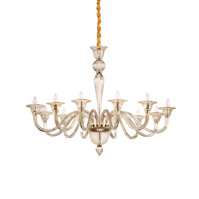 The Starbeam Glass 12 Light Chandelier - Brass showcases elegance with its twelve gracefully curved arms, each adorned with candle-shaped bulbs. Suspended by a golden cord and featuring a central ornate stem, this hand-blown glass chandelier radiates luxury and timeless beauty.
